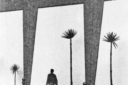 Un homme marche "alone in la" dans un décor surréaliste